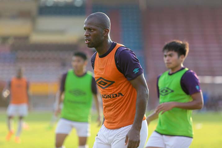 Business student Bruce Djite soccer-training